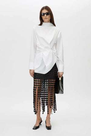 Orlo Skirt by Camilla and Marc – a black lace midi skirt with an asymmetric hemline and soft lining, perfect for elegant evening styling.