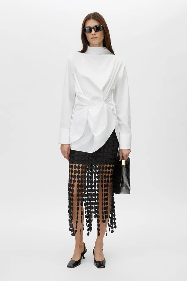 Orlo Skirt by Camilla and Marc – a black lace midi skirt with an asymmetric hemline and soft lining, perfect for elegant evening styling.