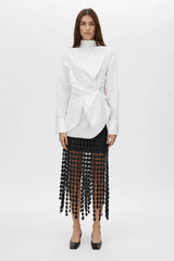 Orlo Skirt by Camilla and Marc – a black lace midi skirt with an asymmetric hemline and soft lining, perfect for elegant evening styling.
