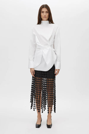 Orlo Skirt by Camilla and Marc – a black lace midi skirt with an asymmetric hemline and soft lining, perfect for elegant evening styling.