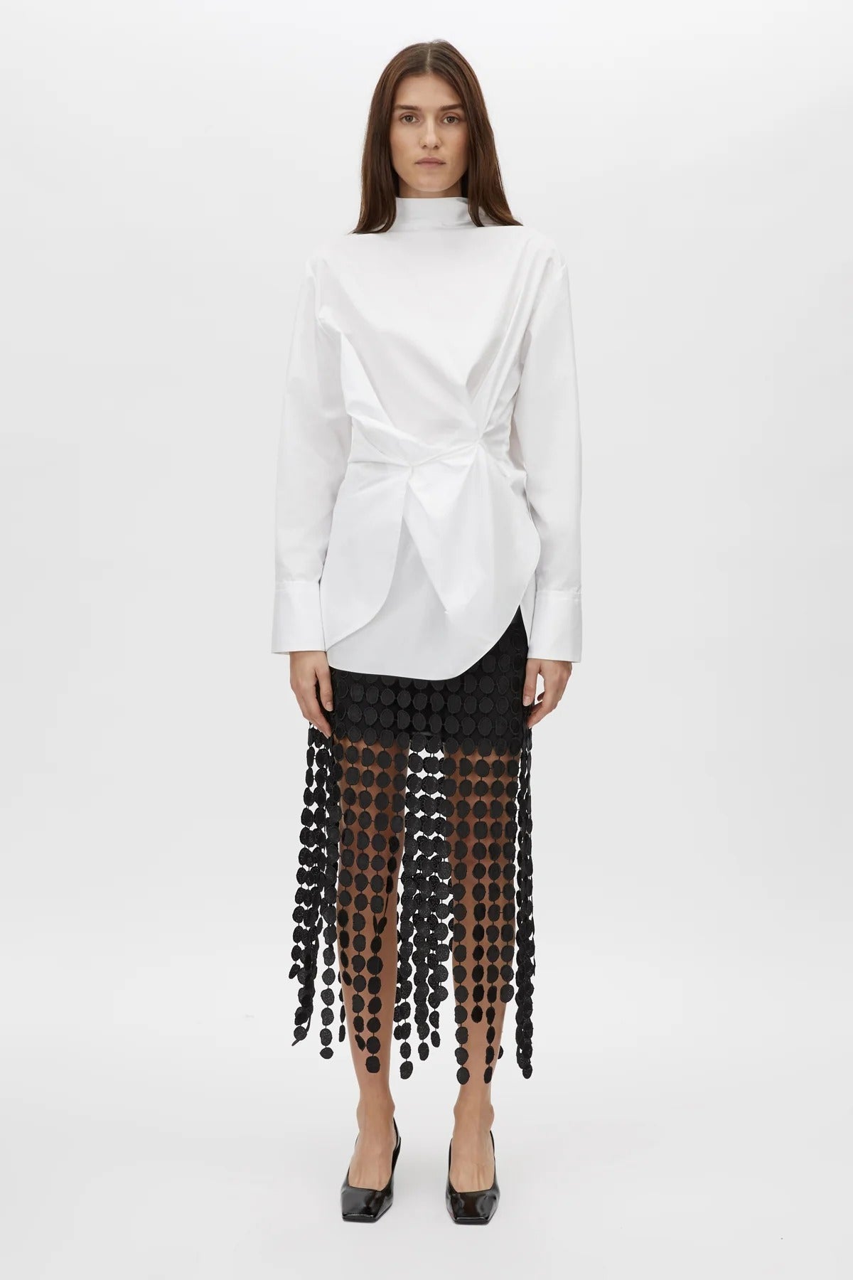 Orlo Skirt by Camilla and Marc – a black lace midi skirt with an asymmetric hemline and soft lining, perfect for elegant evening styling.