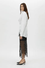 Orlo Skirt by Camilla and Marc – a black lace midi skirt with an asymmetric hemline and soft lining, perfect for elegant evening styling.