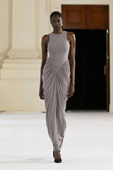 Othelia Gown Mushroom by Effie Kats, a sheer mesh gown with signature neckline and earthy tone. Perfect for autumn weddings or dinners.