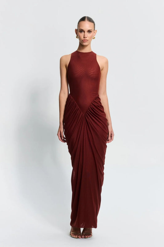 Othelia Gown Rust by Effie Kats, a sheer mesh gown with signature neckline and earthy tone. Perfect for autumn weddings or dinners.