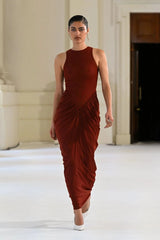 Othelia Gown Rust by Effie Kats, a sheer mesh gown with signature neckline and earthy tone. Perfect for autumn weddings or dinners.