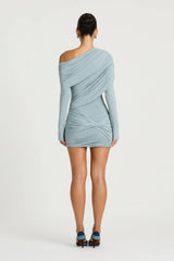 Otto Long Sleeve Mini Dress in Blue Fog by Benni, a draped off-shoulder jersey mini with twisted skirt and long sleeves.