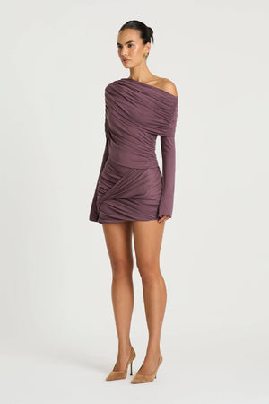 Otto Long Sleeve Mini Dress in Grape by Benni, a draped off-shoulder jersey mini with twisted skirt and long sleeves.