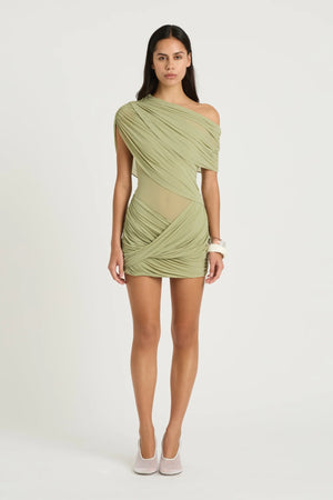 Otto Mini Dress Pistachio by Benni, asymmetric one-shoulder mini with sheer bodice and twisted draped skirt, a bold trendy look for nights out.