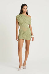 Otto Mini Dress Pistachio by Benni, asymmetric one-shoulder mini with sheer bodice and twisted draped skirt, a bold trendy look for nights out.