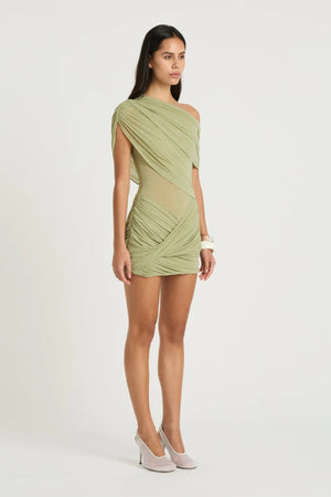 Otto Mini Dress Pistachio by Benni, asymmetric one-shoulder mini with sheer bodice and twisted draped skirt, a bold trendy look for nights out.