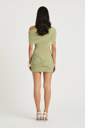 Otto Mini Dress Pistachio by Benni, asymmetric one-shoulder mini with sheer bodice and twisted draped skirt, a bold trendy look for nights out.