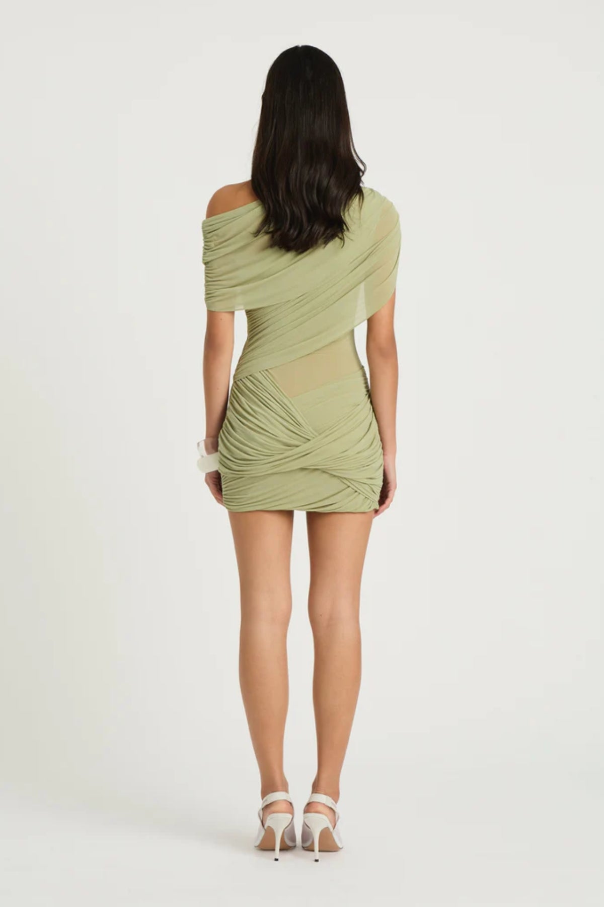 Otto Mini Dress Pistachio by Benni, asymmetric one-shoulder mini with sheer bodice and twisted draped skirt, a bold trendy look for nights out.