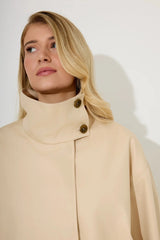 Oversized Cotton Mix Jacket in Cream by Odd Muse – funnel neck oversized jacket with drawstring and relaxed fit.