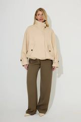 Oversized Cotton Mix Jacket in Cream by Odd Muse – funnel neck oversized jacket with drawstring and relaxed fit.