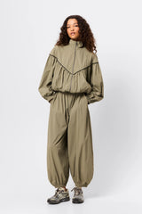 Overturn Jacket Fern by Mossman - lightweight technical jacket with funnel neckline and voluminous sleeves, perfect for modern elevated layering.