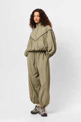 Overturn Jacket Fern by Mossman - lightweight technical jacket with funnel neckline and voluminous sleeves, perfect for modern elevated layering.