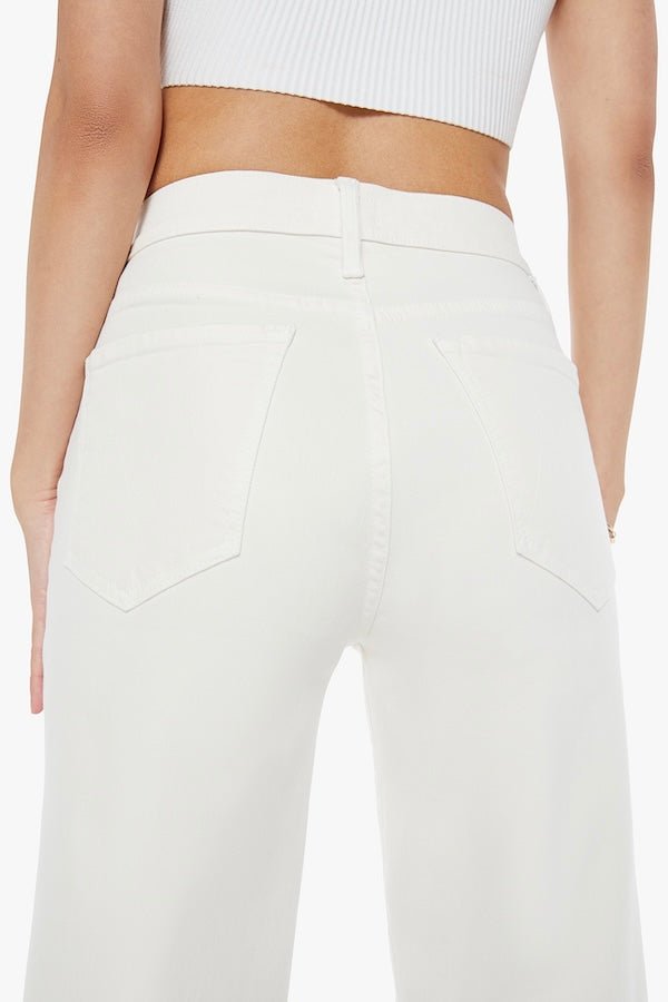 The Rambler Zip Ankle Cream Puffs by MOTHER, trendy high-waisted pants with a wide straight-leg design and ankle-length cut. Perfect for a relaxed, refined look with a soft off-white wash and tonal hardware.