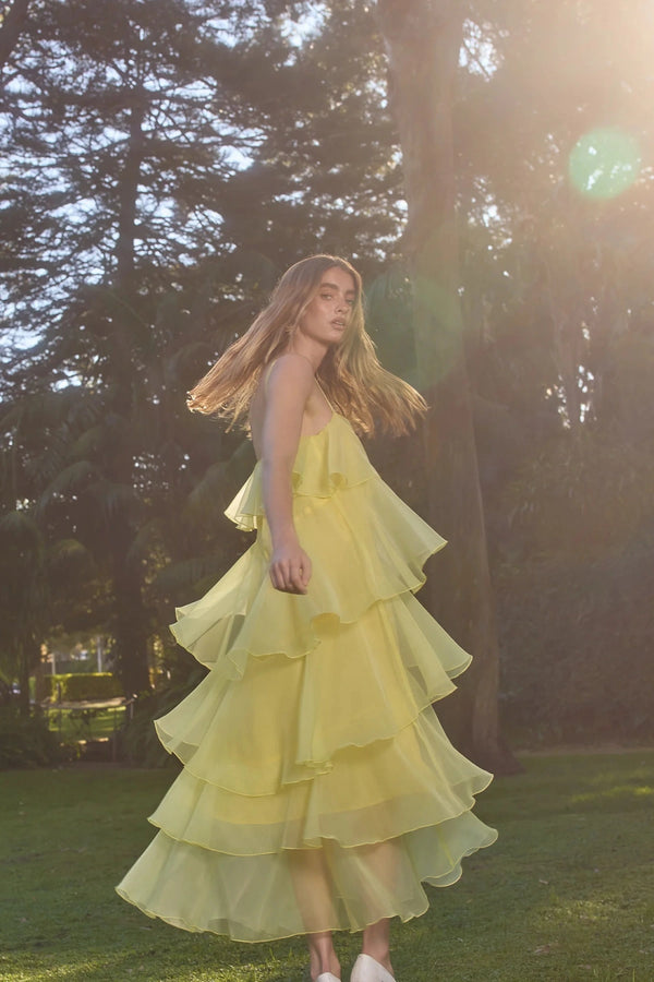 PASDUCHAS Cleo Tiered Maxi Dress – soft-touch organza maxi with adjustable straps, petal details, and tiered skirt in romantic flowy design.
