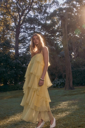 PASDUCHAS Cleo Tiered Maxi Dress – soft-touch organza maxi with adjustable straps, petal details, and tiered skirt in romantic flowy design.
