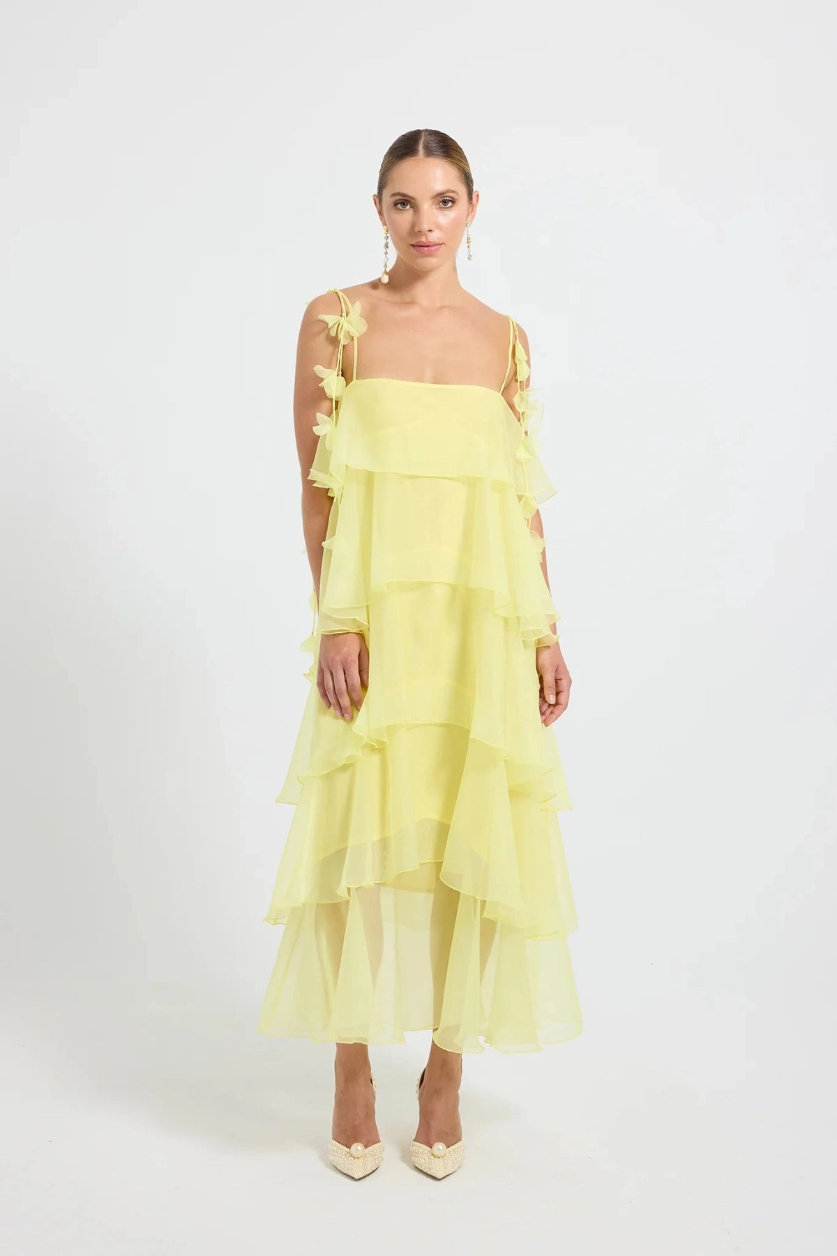 PASDUCHAS Cleo Tiered Maxi Dress – soft-touch organza maxi with adjustable straps, petal details, and tiered skirt in romantic flowy design.
