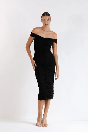 New Horizon Tapered Midi Black by Pasduchas – A trendy off-shoulder midi with ruched stretch mesh, sheer straps, and a flattering fitted silhouette. Perfect for elegant evenings and stylish occasions.