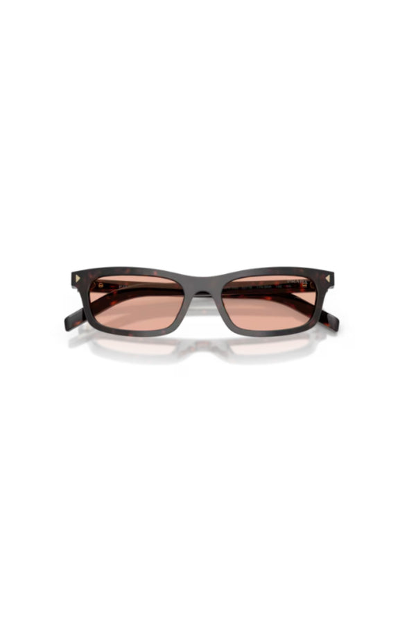 PR D05S Root Tortoise Pink by Prada – a rectangular frame with pink lenses and sleek metal logo detail. Perfect for bold styling.