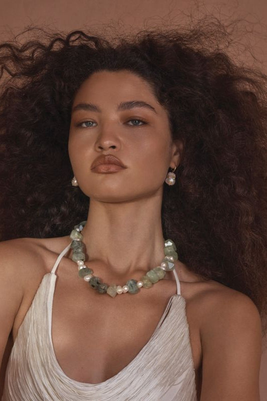 Palma Necklace by Amber Sceats – handcrafted in Italy with 24K gold plating, prehnite stones, and freshwater pearls for timeless luxury.
