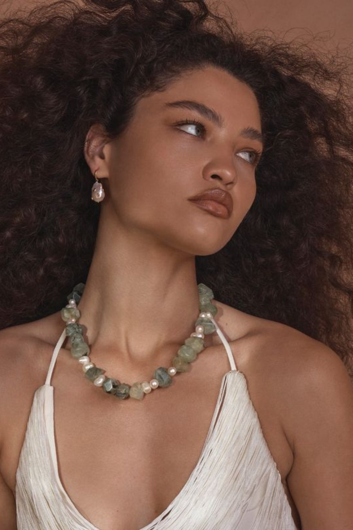 Palma Necklace by Amber Sceats – handcrafted in Italy with 24K gold plating, prehnite stones, and freshwater pearls for timeless luxury.
