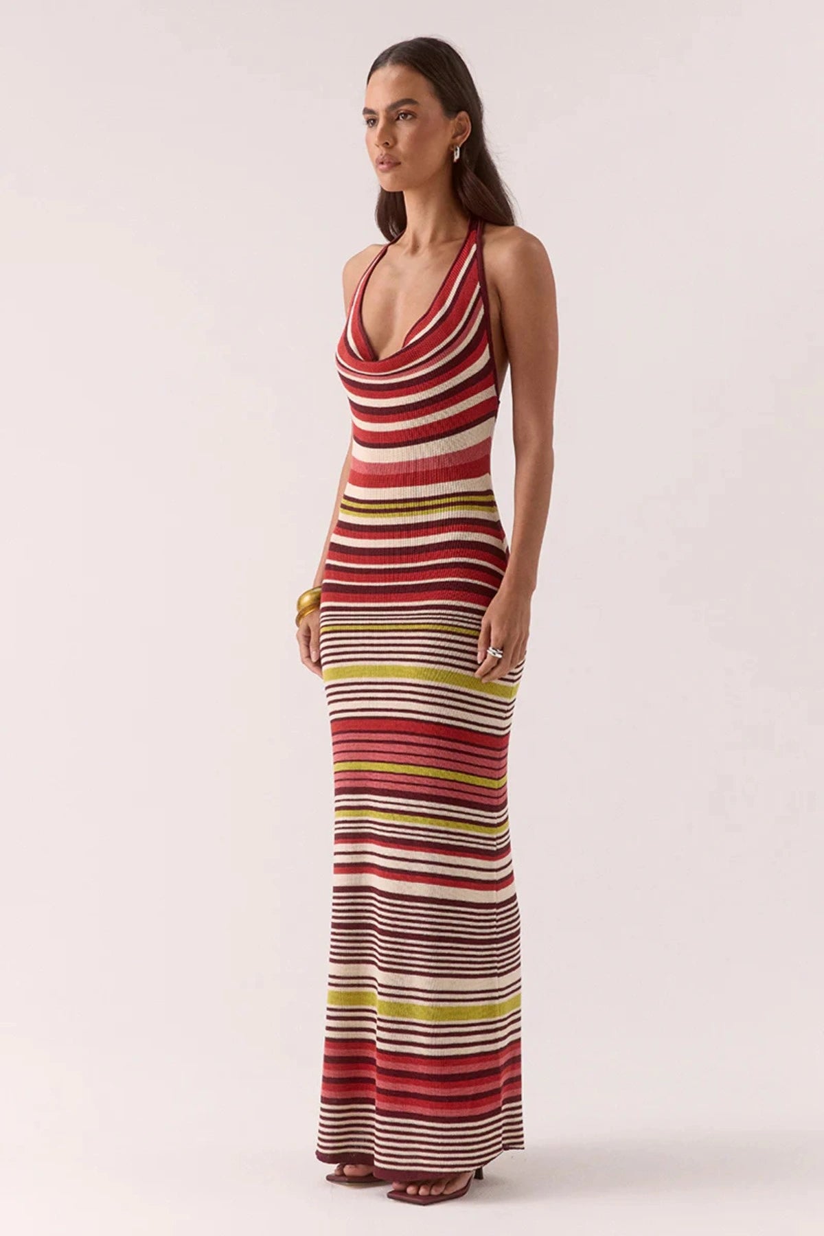 Pandora Knit Dress Stripe by Sovere – halter neck maxi with cowl neckline and fitted silhouette. Perfect for sunset dinners or nights out.
