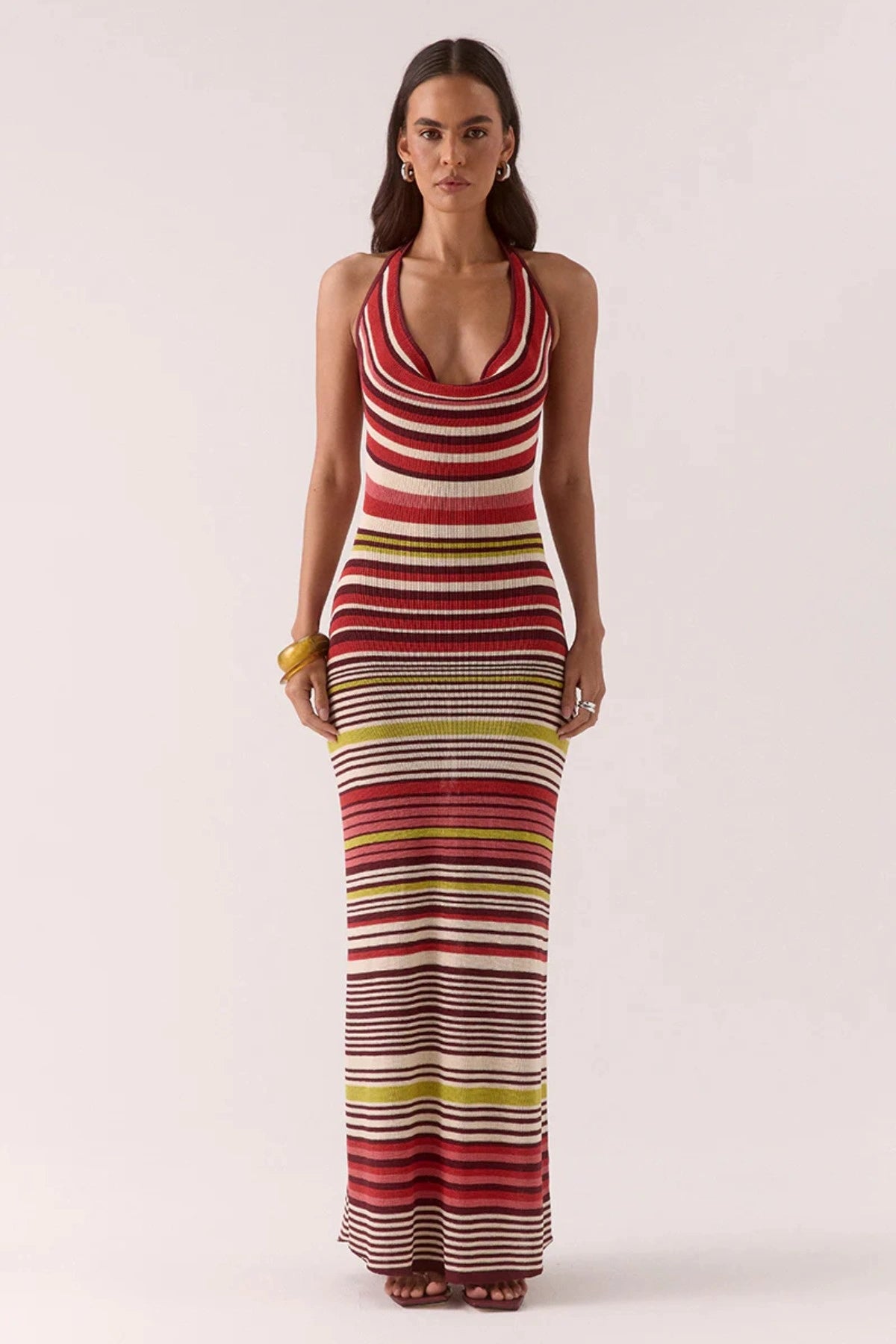 Pandora Knit Dress Stripe by Sovere – halter neck maxi with cowl neckline and fitted silhouette. Perfect for sunset dinners or nights out.