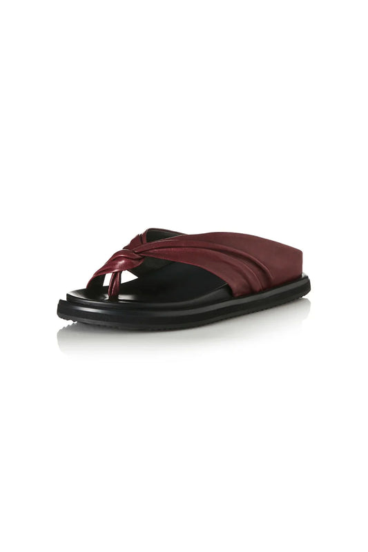 Paola Sandal in Burgundy Leather by Alias Mae, a ruched leather flat with twisted thong detail and moulded footbed, perfect for relaxed, refined styling.
