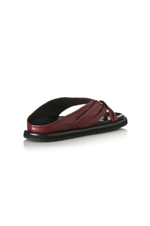 Paola Sandal in Burgundy Leather by Alias Mae, a ruched leather flat with twisted thong detail and moulded footbed, perfect for relaxed, refined styling.