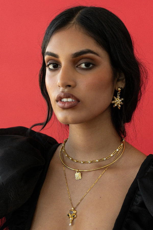 Pari Earrings Gold by Mountain and Moon – gold plated statement earrings with bold design. Perfect for elevated styling.