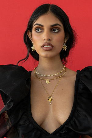 Pari Earrings Gold by Mountain and Moon – gold plated statement earrings with bold design. Perfect for elevated styling.