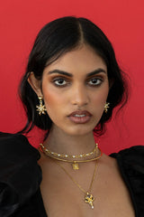 Pari Earrings Gold by Mountain and Moon – gold plated statement earrings with bold design. Perfect for elevated styling.