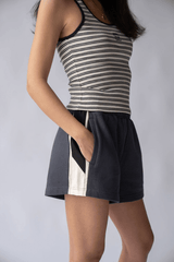 Parisienne Track Short Noir by Araminta James, cotton shorts with elastic waist and contrast trim. Perfect for casual days or off duty looks.
