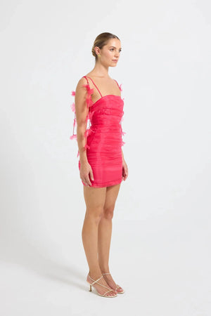 Pasduchas Cleo Mini Dress in soft-touch organza, featuring square neckline, removable petal strap details, fitted silhouette, and mini length.
