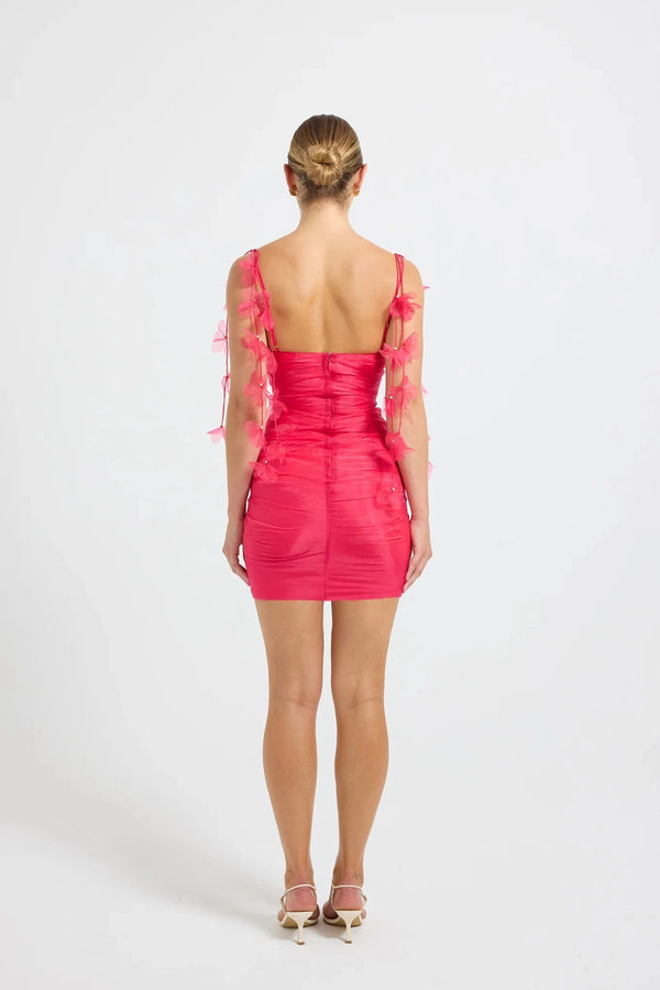 Pasduchas Cleo Mini Dress in soft-touch organza, featuring square neckline, removable petal strap details, fitted silhouette, and mini length.
