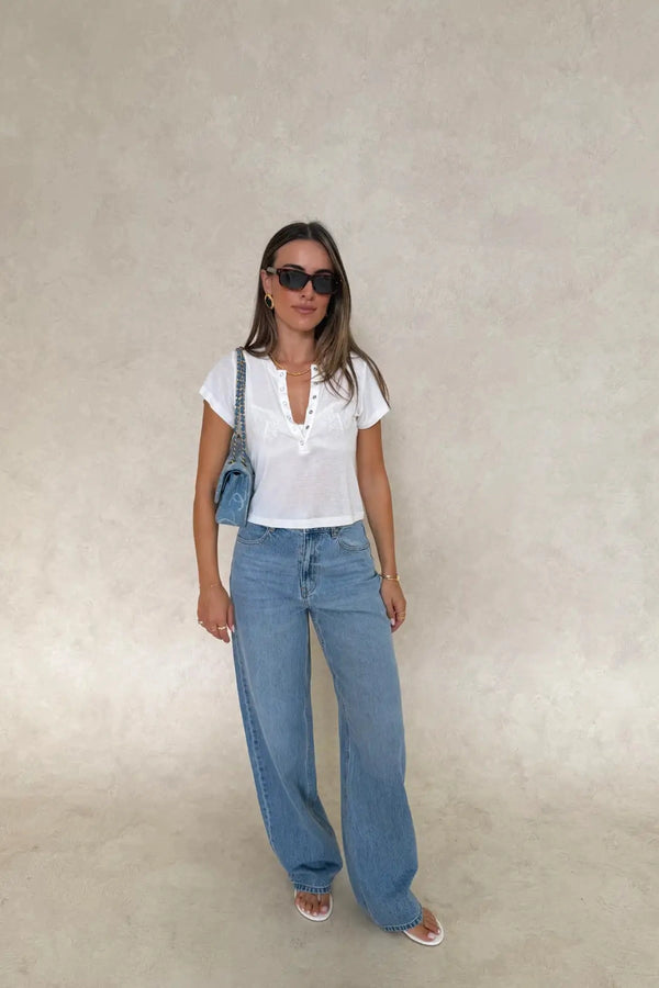 Pat Baby Tee by Sneaky Link – a soft fitted henley tee with ribbed neckline and stretch. Perfect for easy everyday layering.