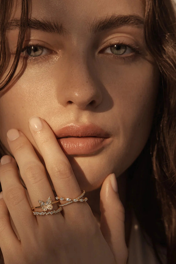 Path to You Ring by By Charlotte – 18k gold vermeil crossover ring with double bands and sparkling cubic zirconias symbolising connection.