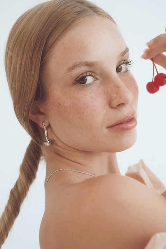 Penelope Earrings in Silver by Avant Studio, silver cherry earrings with playful design. Perfect for everyday wear or statement styling.