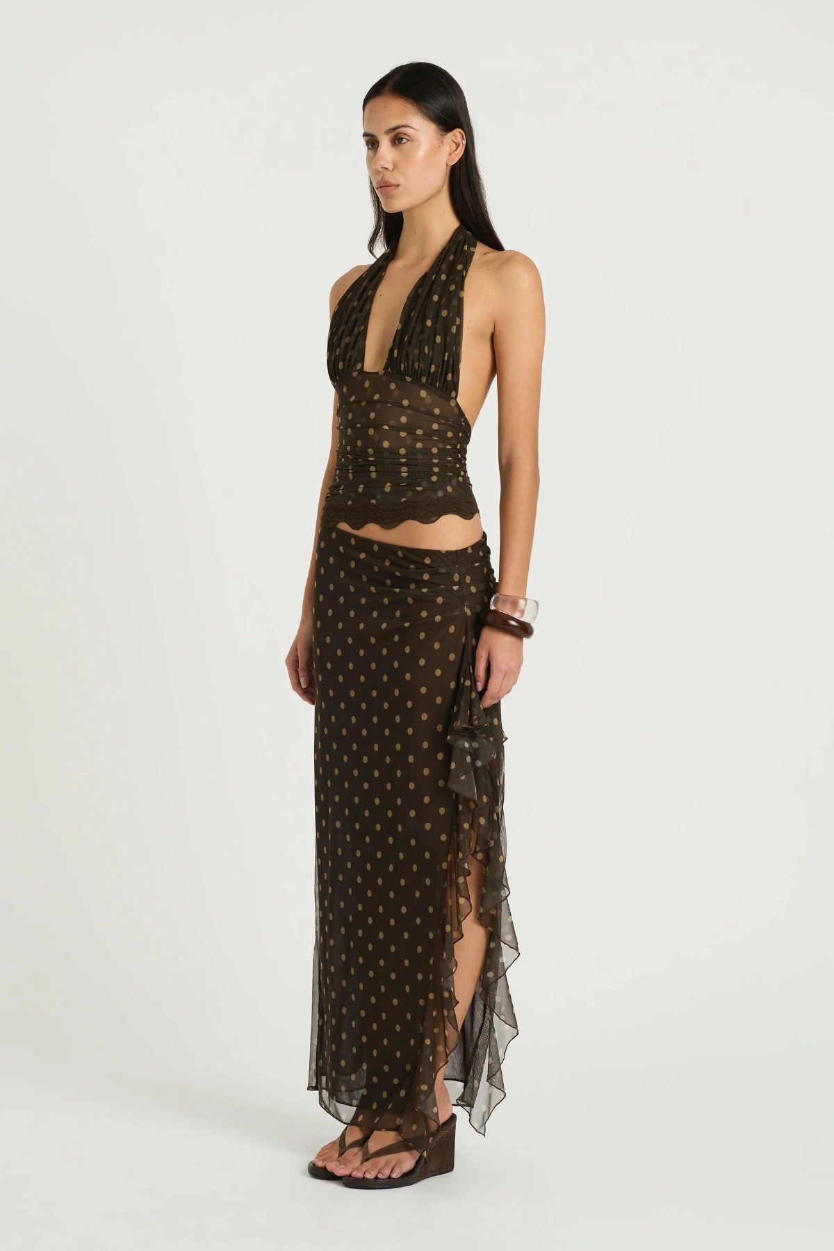 Penelope Maxi Dress by Benni — a stretch mesh halter dress with a gathered waist and thigh-high split, perfect for elegant warm-weather events.