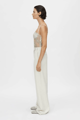 Peregrine Lace Bodysuit in Cream by Camilla and Marc, soft cream lace with scalloped bust cups and adjustable straps, perfect for layering or wearing as a chic, standalone piece.