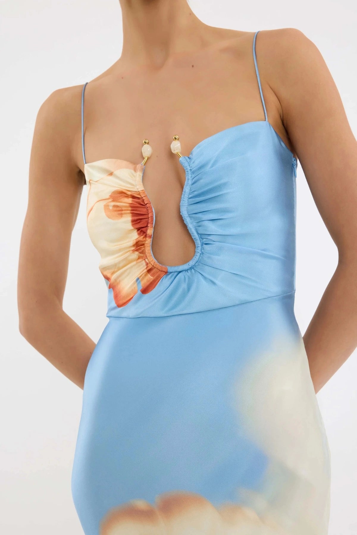 Perez Maxi Dress by Rebecca Vallance, a floral silk gown with gold U-wire and bodice cut-outs. Perfect for weddings and formal events.