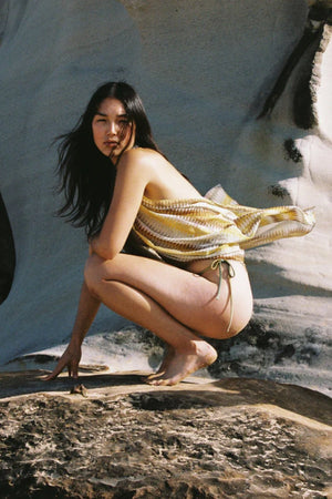 Petite Pareo Aurora by Soleil Soleil - organic cotton wrap pareo with geometric print, designed for versatile beach and resort styling.