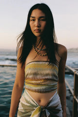 Petite Pareo Aurora by Soleil Soleil - organic cotton wrap pareo with geometric print, designed for versatile beach and resort styling.