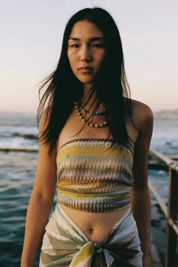 Petite Pareo Aurora by Soleil Soleil - organic cotton wrap pareo with geometric print, designed for versatile beach and resort styling.