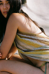 Petite Pareo Aurora by Soleil Soleil - organic cotton wrap pareo with geometric print, designed for versatile beach and resort styling.