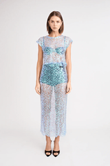 Delphine Skirt by Pfeiffer, relaxed midi length with mid-rise fit, sequin knit fabric. Ideal for layering over swimwear or briefs, 100% polyester. Spot clean only.