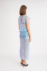 Delphine Skirt by Pfeiffer, relaxed midi length with mid-rise fit, sequin knit fabric. Ideal for layering over swimwear or briefs, 100% polyester. Spot clean only.